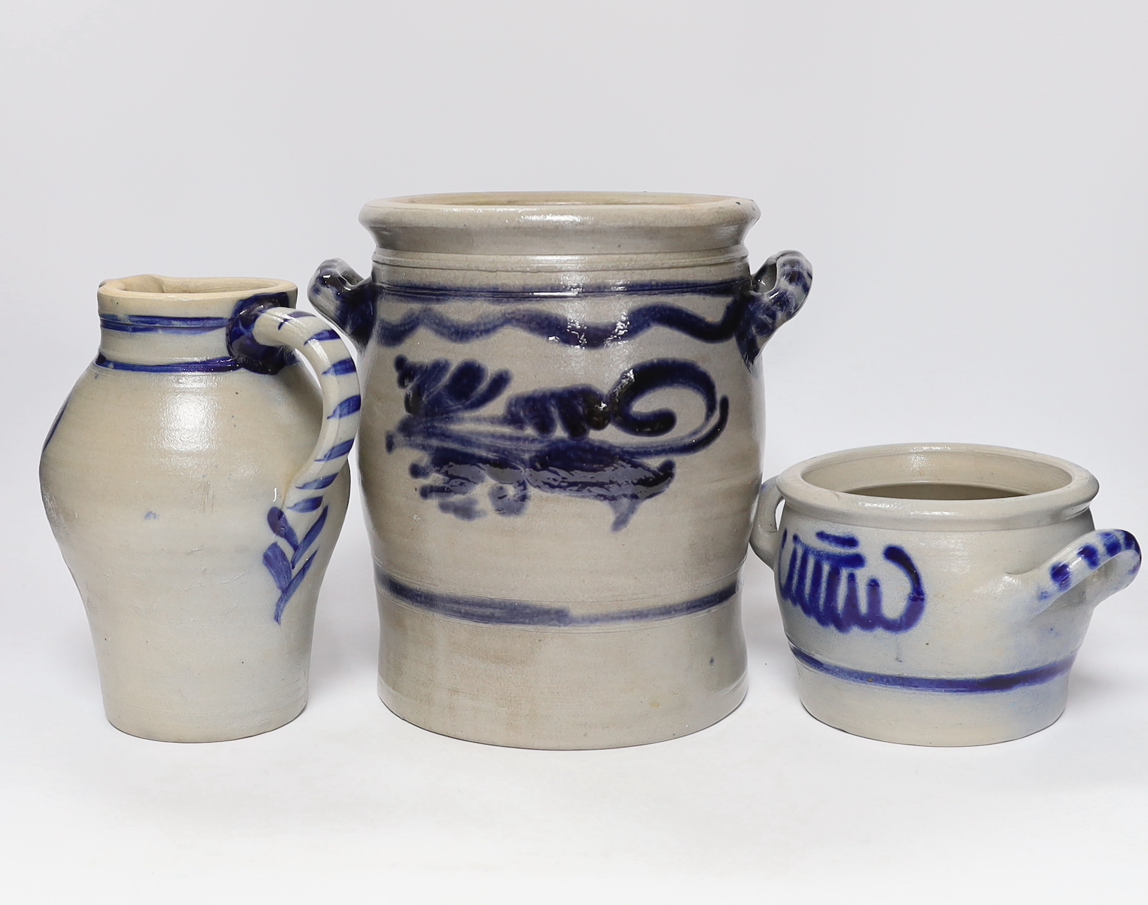 Three 19th century German saltglaze vessels, 23cm